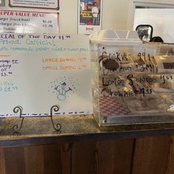 Goodwood Grill - Specials of the day and dessert display