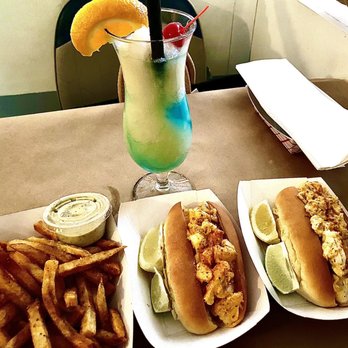Theboil - Cajun Fries, Lobster Roll, Crab Roll and a Blue Bae Cocktail. - Seafood Near Me - Jersey City, New Jersey Theboil - Cajun Fries, Lobster Roll, Crab Roll and a Blue Bae Cocktail. - Seafood Near Me - Jersey City, New Jersey