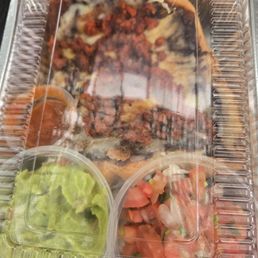 Leftover molletes breakfast enough for another serving at home with a good amount of guacamole and pico