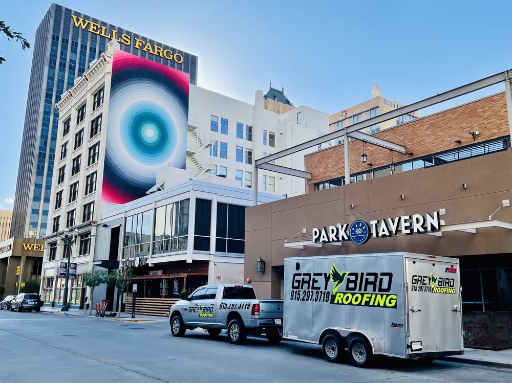 Slide of Grey Bird Roofing