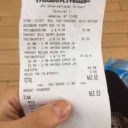 a person holding a receipt