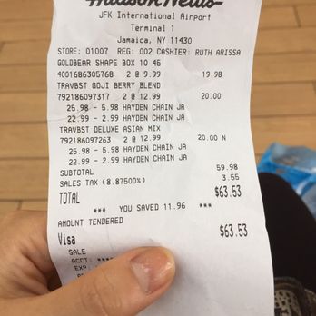 Hudson News - a person holding a receipt - Convenience Stores Near Me - Jamaica, New York