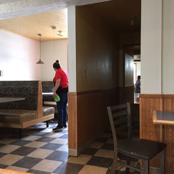 La Choza - a woman cleaning a restaurant - Mexican Near Me - Omaha, Nebraska