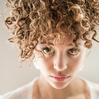 Parlour - Parlour, home to certified natural Curl Specialist Andrea Bonawitz. Model image (Hair by Andrea. Photo by Stephen Reardon, Model Lexi Mills) - Hair Salons Near Me - Rochester, New York