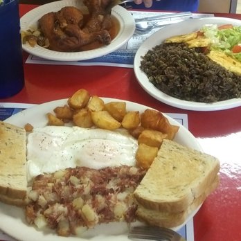 Paradis Des iLes Restaurant - Chicken in Sauce with sides and House Specialty eggs and hash. - American Near Me - Spring Hill, Florida Paradis Des iLes Restaurant - Chicken in Sauce with sides and House Specialty eggs and hash. - American Near Me - Spring Hill, Florida