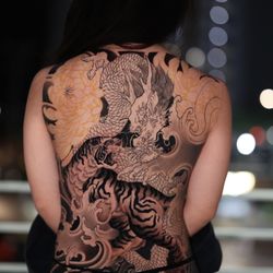 Slick Vision Tattoo and Laser Removal - Fullback Tiger and dragon.
