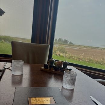Drakes Fireside Lounge - Table with view outside - New American Near Me - Bodega Bay, California