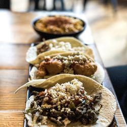 Chivo Taqueria - #steaknews taco, big shrimpin' taco, and the clusterduck taco in that order. With a side of off the cob street corn.