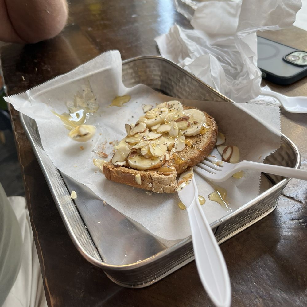 District Coffee - Peanut butter toast with bananas and almonds - Coffee & Tea Near Me - El Paso, Texas
