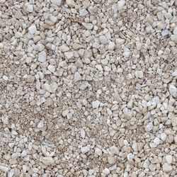 Southwest Boulder & Stone - This is the Snow White Crushed Rock received. The quality was very poor and required filtering out mixed in sediment/decomposed granite.