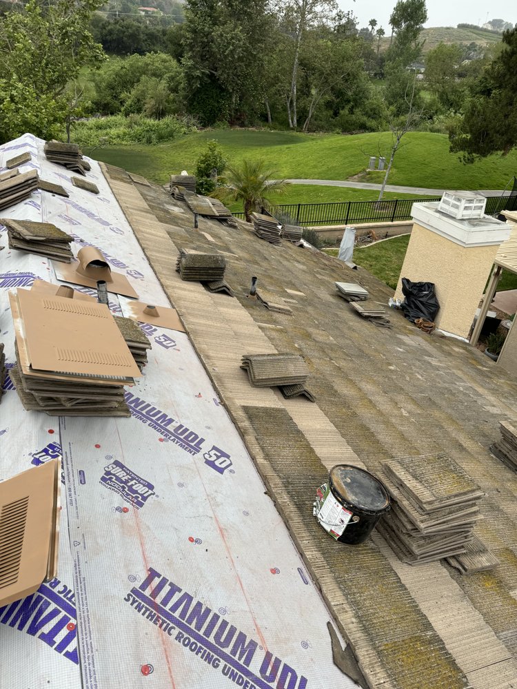 Slide of Millennium Roofing