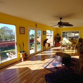 Aesthetic Elements Construction - a bright yellow living room - General Contractors Near Me - San Leandro, California