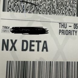 FedEx Next Day Air shipping label. FedEx Next Day Air shipping label.