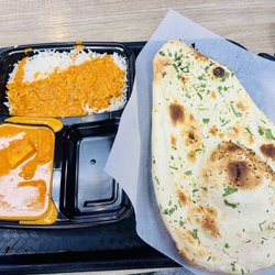 Nina’s Indian Grocery & Restaurant - Chicken Tikka Masala and Garlic Naan Bread