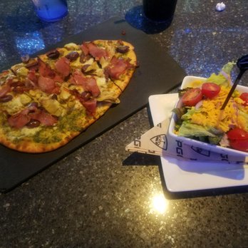 Topgolf - Prosciutto Flatbread and house salad. - Sports Bars Near Me - Alpharetta, Georgia Topgolf - Prosciutto Flatbread and house salad. - Sports Bars Near Me - Alpharetta, Georgia