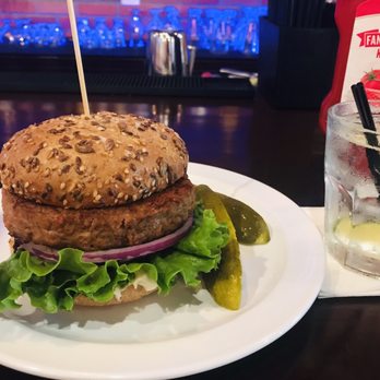 Burger District  - Vegan Burger , pickles with Gin & Tonic - Burgers Near Me - Arlington, Virginia