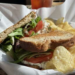 Chicken salad sandwich on wheat berry.