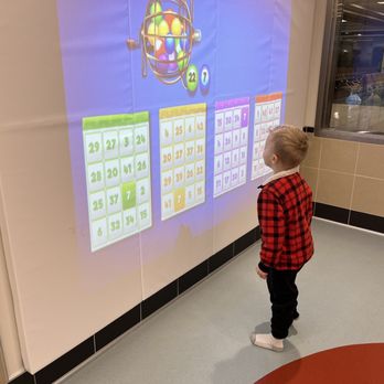 Dane County Regional Airport - Children's play area with interactive game - Airports Near Me - Madison, Wisconsin
