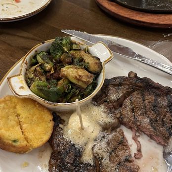 Rancho Seco Steakhouse - Ribeye, cornbread and Brussels - Steakhouses Near Me - Mount Pleasant, Texas