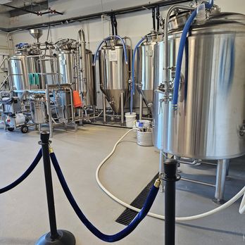 Grace Note Brewing - a row of stainless steel tanks - Breweries Near Me - Jacksonville, Florida Grace Note Brewing - a row of stainless steel tanks - Breweries Near Me - Jacksonville, Florida