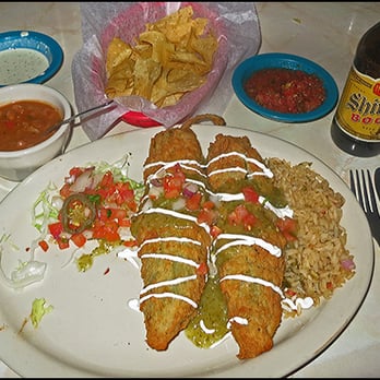 Chuy's - Chile rellenos with Chuy's deluxe Tomatillo Sauce - Tex-Mex Near Me - Webster, Texas