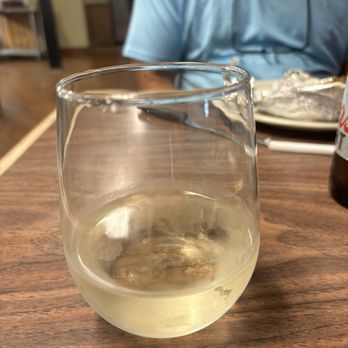 Hermann Sons Steakhouse - This is the glass of $8 I got and after eating by 1/2 of my meal. Will not. One back - Steakhouses Near Me - Hondo, Texas