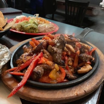 L & J Cafe - My combination fajitas with the smoke still rolling off of them. Possibly the best I've ever had. - Mexican Near Me - El Paso, Texas L & J Cafe - My combination fajitas with the smoke still rolling off of them. Possibly the best I've ever had. - Mexican Near Me - El Paso, Texas