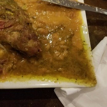 El Rocoto - They might want to revisit their plating options... server even had the hard time setting it on the table to avoid spillage. - Peruvian Near Me - Gardena, California