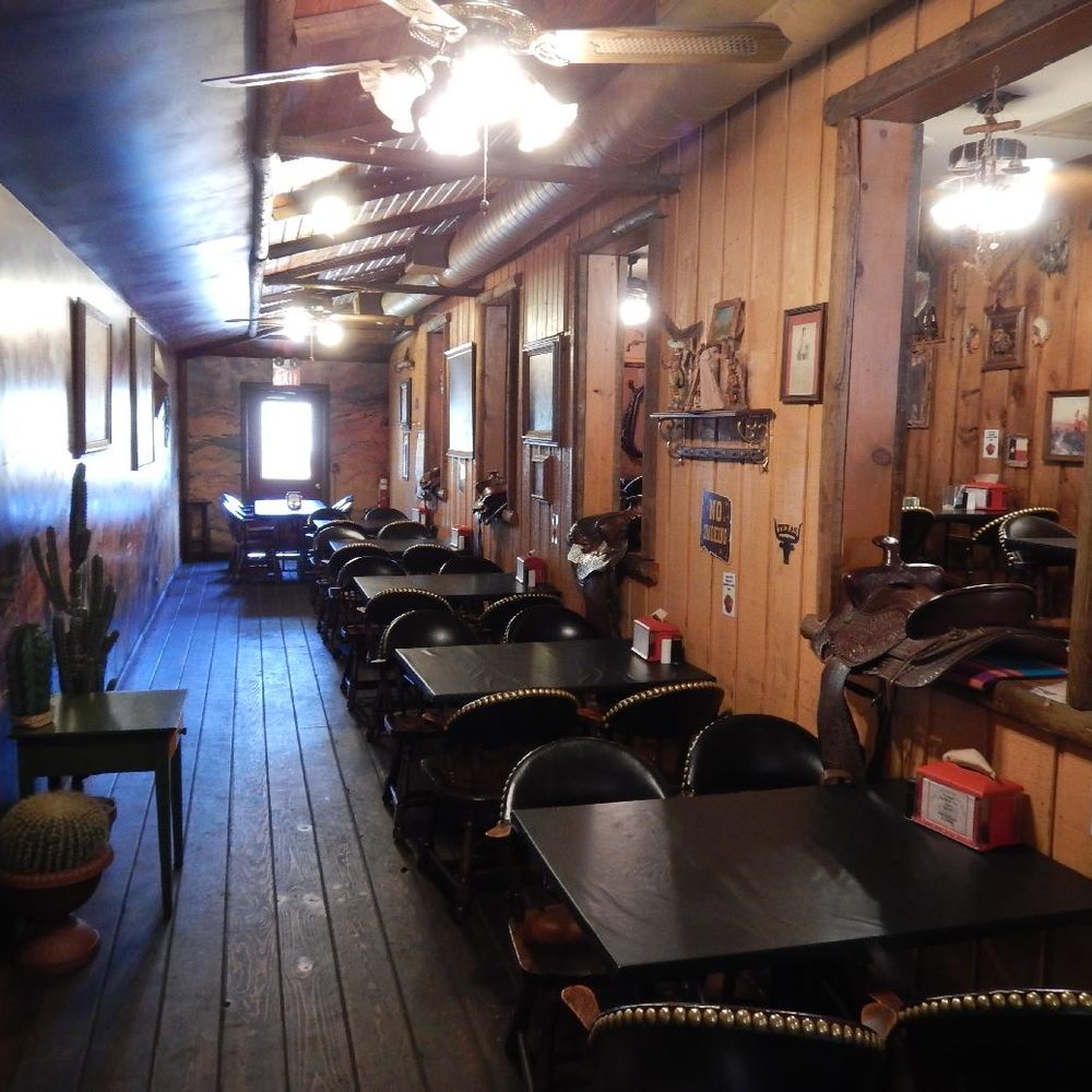 Texan BBQ - This seating area is farthest from the front door. - Barbeque Near Me - Algonquin, Illinois Texan BBQ - This seating area is farthest from the front door. - Barbeque Near Me - Algonquin, Illinois