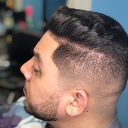 Colossal Cuts - Mid fade / with beard