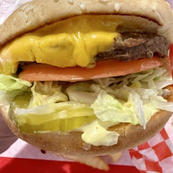 Burger Land - Texas Burgers (beef patty, American cheese, iceberg lettuce, tomatoes, pickles, onions, mayo, sesame bun); IG: @katzlundell - Burgers Near Me - Tulare, California