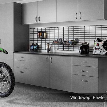 Dream Garage - a dirt bike in a garage - General Contractors Near Me - Edmonton, Alberta Dream Garage - a dirt bike in a garage - General Contractors Near Me - Edmonton, Alberta