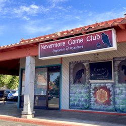 Front of Game Center entrance on left