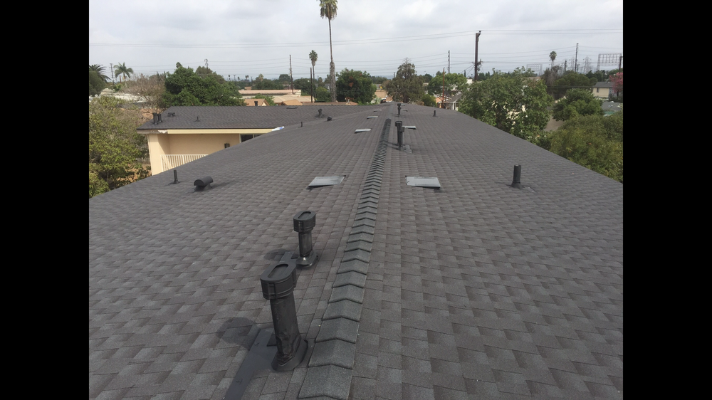 Slide of Ruiz Roofing Construction