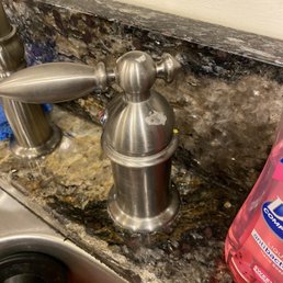 Faucet left with residue in it after cleaning Faucet left with residue in it after cleaning