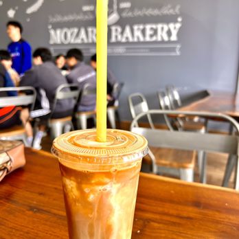 Mozart Bakery - a cup of bubble tea on a table - Bakeries Near Me - Carrollton, Texas Mozart Bakery - a cup of bubble tea on a table - Bakeries Near Me - Carrollton, Texas