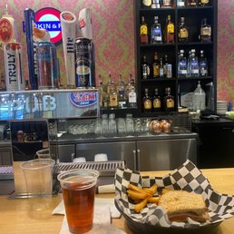 a sandwich and a drink on a table a sandwich and a drink on a table