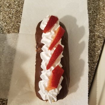 Ducky's Donut Shack - Chocolate Frosted Long John with Whipped Cream and Strawberries - Donuts Near Me - Orangevale, California Ducky's Donut Shack - Chocolate Frosted Long John with Whipped Cream and Strawberries - Donuts Near Me - Orangevale, California
