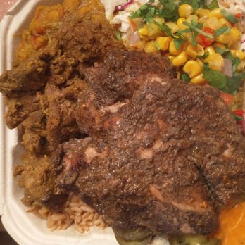 Scotty Bons Caribbean Grill - Half & half jerk chicken/ curry goat - Caribbean Near Me - Scarborough, Ontario
