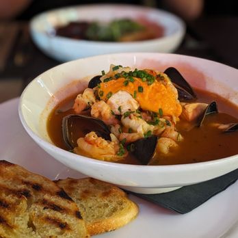 Red Door Bistro - West Coast Bouillabaisse - Bistros Near Me - Whistler, British Columbia Red Door Bistro - West Coast Bouillabaisse - Bistros Near Me - Whistler, British Columbia