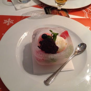 School restaurant & lounge - Sorbet (homemade) served in frozen ice bowl topped with a shot of absolut vodka - Modern European Near Me - Prague, Puerto Rico