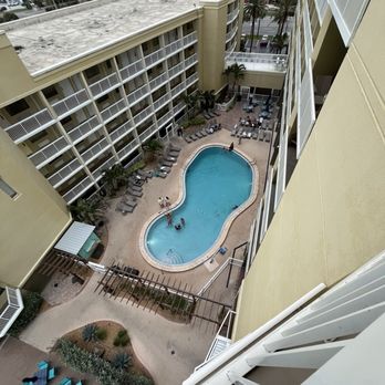 Crowne Plaza Melbourne - Oceanfront by IHG - 8th floor corner suite view of the pool - Hotels Near Me - Melbourne, Florida