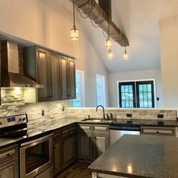 Kinsey Developers - Complete gut and renovation. Added a beam for an extra touch of rustic!