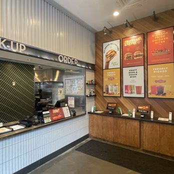 Shake Shack Piedmont Park - Inside at the counter area - Burgers Near Me - Atlanta, Georgia Shake Shack Piedmont Park - Inside at the counter area - Burgers Near Me - Atlanta, Georgia