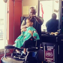 Essentials Barber And Beauty Salon - Keeping him interested in what is going on