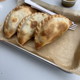 Empanadas! Fresh, hot and delicious. Empanadas! Fresh, hot and delicious.