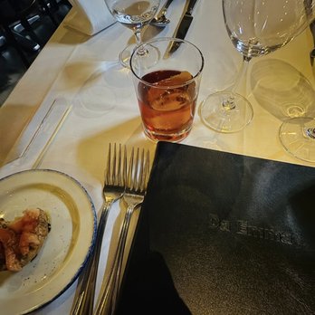 Da Emma - Fresh baked bread, Burrata and prosciutto (oils optional) and a lovely Negroni. - Italian Near Me - Montreal, Quebec