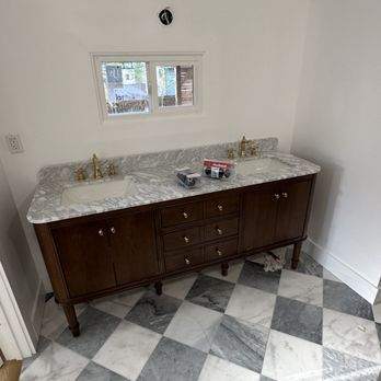Prime Structure - Diagonal marble tile install in bathroom -- precise layout with pattern matching for a high-end, seamless luxury finish. - Tiling Near Me - Aurora, Colorado