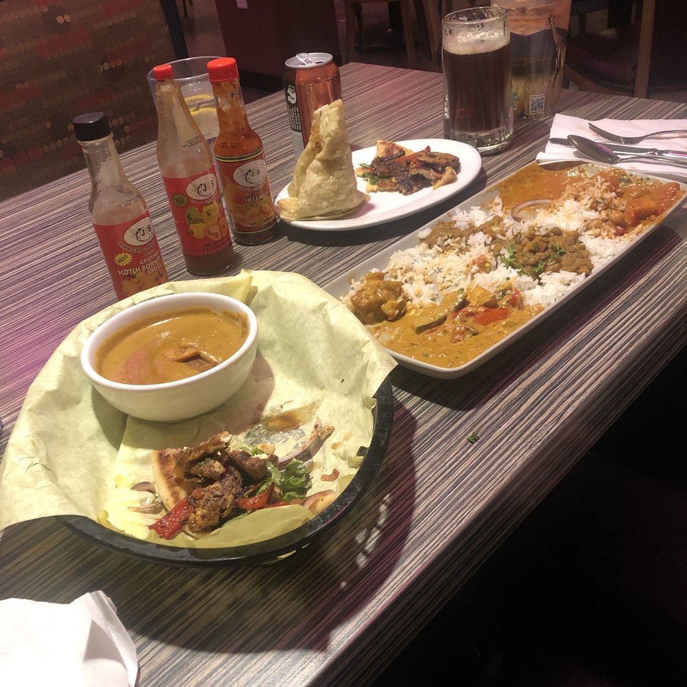Jambo Cafe - Soup Of The Day Coconut Organic Tofu Curry Ethiopian Chickpea Berbere Stew East African Coconut Lentil Stew Jerk Organic Tofu Sandwich - Caribbean Near Me - Santa Fe, New Mexico