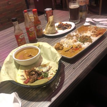 Jambo Cafe - Soup Of The Day Coconut Organic Tofu Curry Ethiopian Chickpea Berbere Stew East African Coconut Lentil Stew Jerk Organic Tofu Sandwich - Caribbean Near Me - Santa Fe, New Mexico